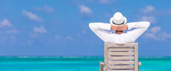 Man enjoying summer vacation on tropical beach